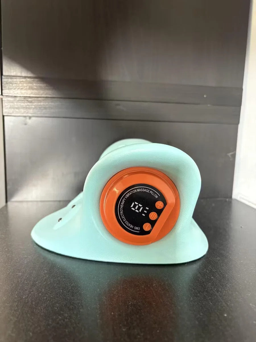 Turquoise neck massager standing on a dark surface, showing the orange control dial
